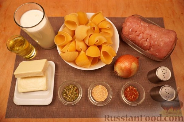 Макароны-ракушки, фаршированные курицей, под сырно-сливочным соусом Макароны-ракушки, фаршированные курицей, под сырно-сливочным соусом